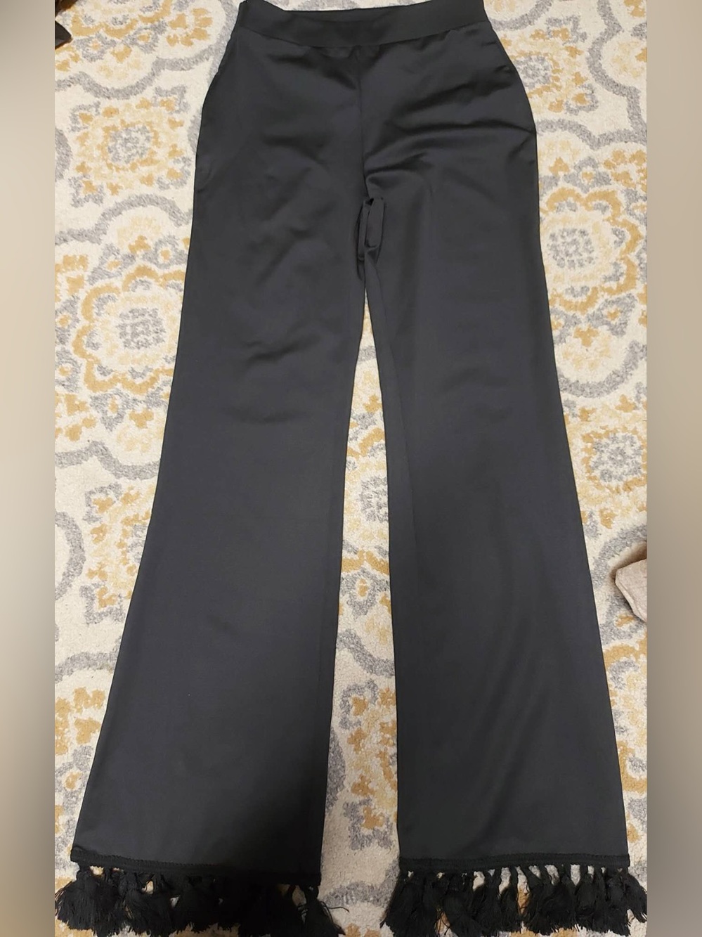 Black flare pants with tassels